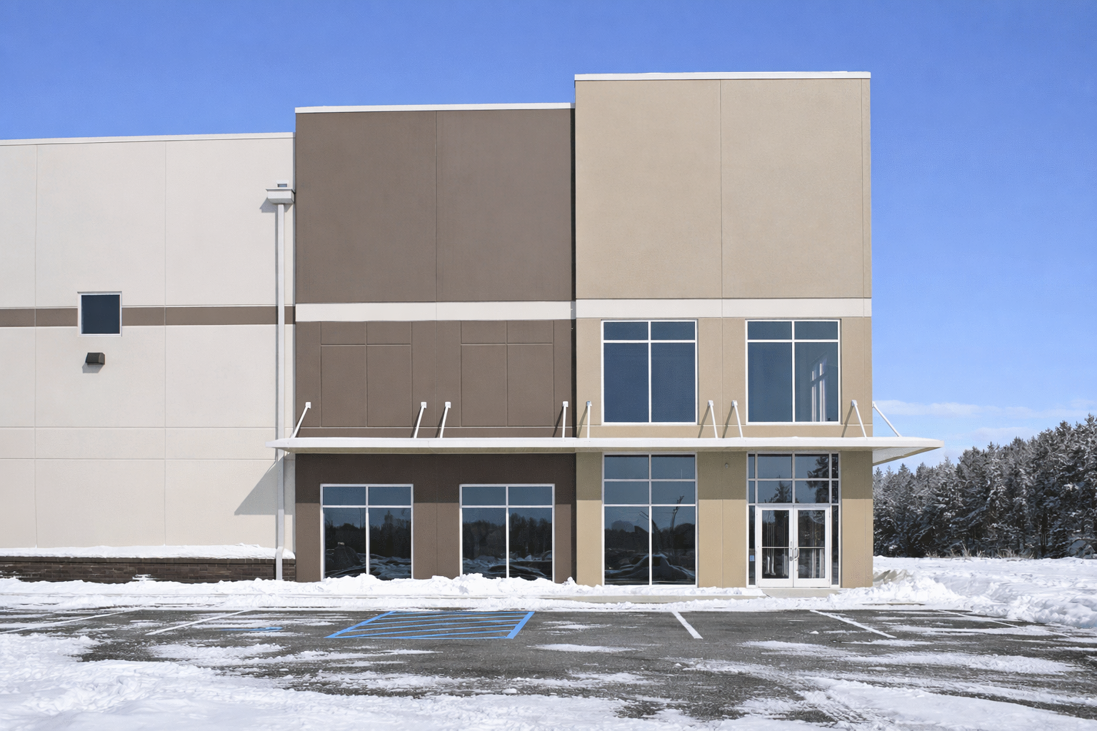 Pre-engineered steel commercial building in a Canadian winter