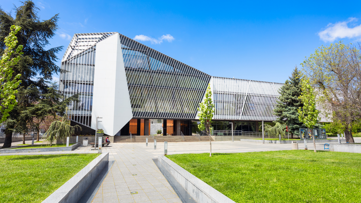 Steel-framed community centre with landscaped entrance
